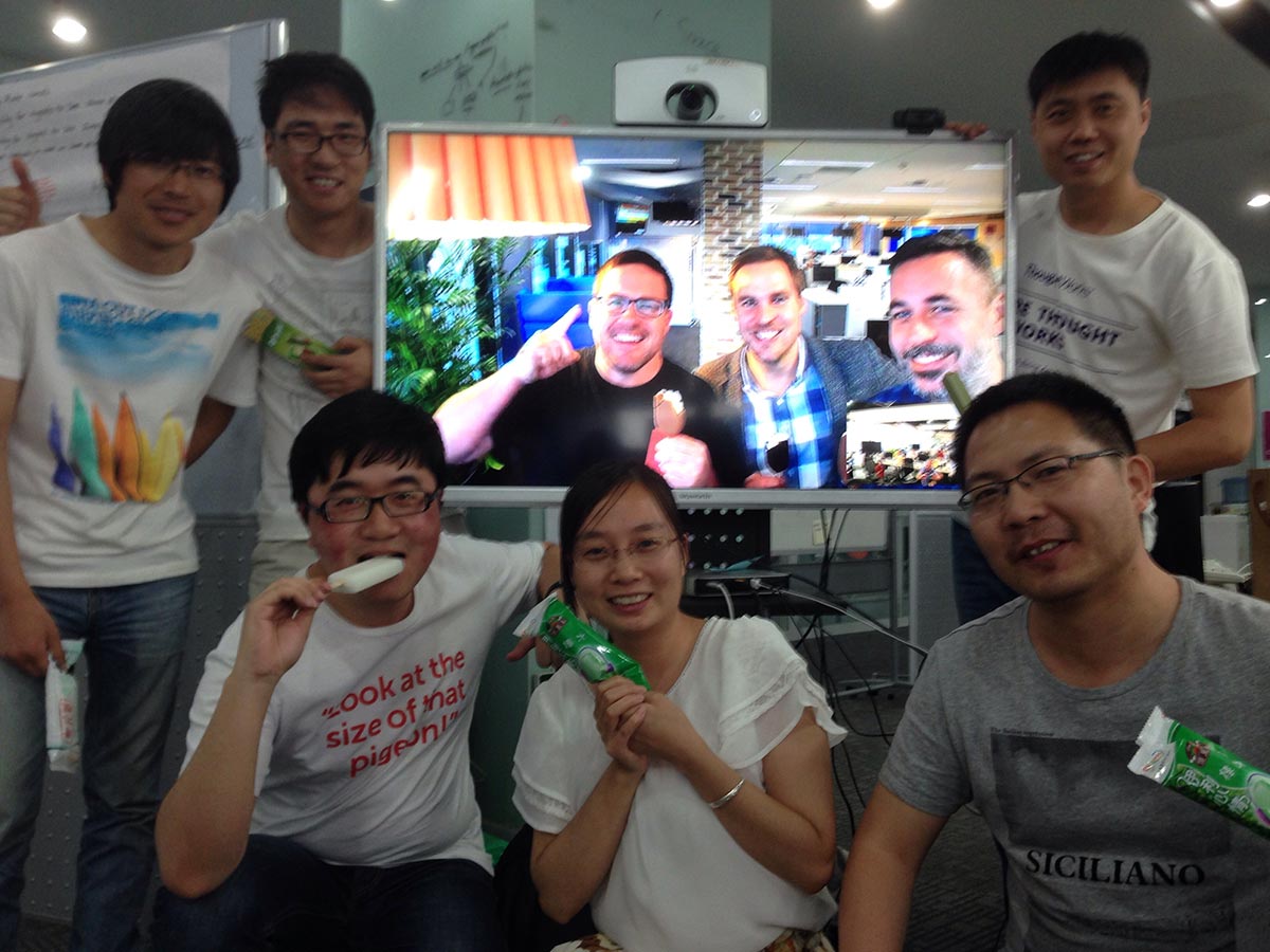 Team members connect via tv