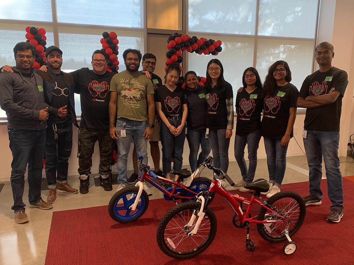 Team members with bikes